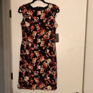 Black and embroidered floral cocktail dress